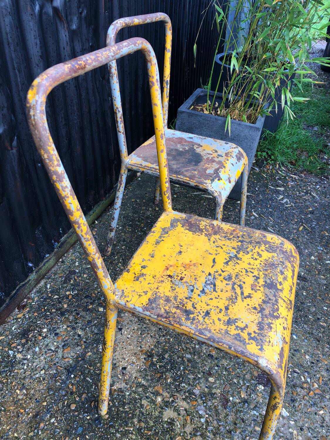 Pair of metal chairs