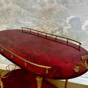 Cherry-red bar cart by Aldo Tura, Italy, 1960s, Hollywood Regency