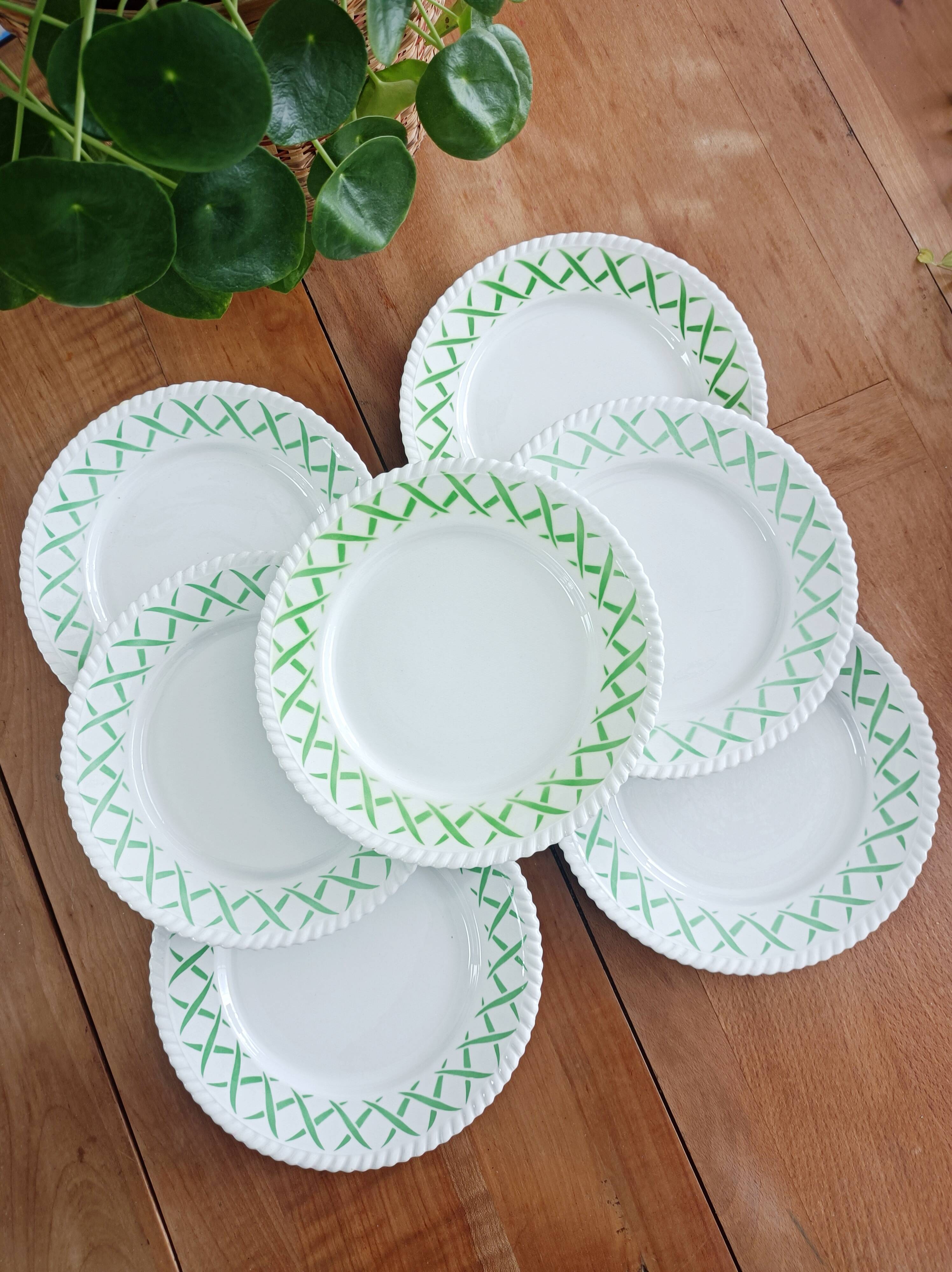 Set of 7 Badonviller flat plates, trellis decor