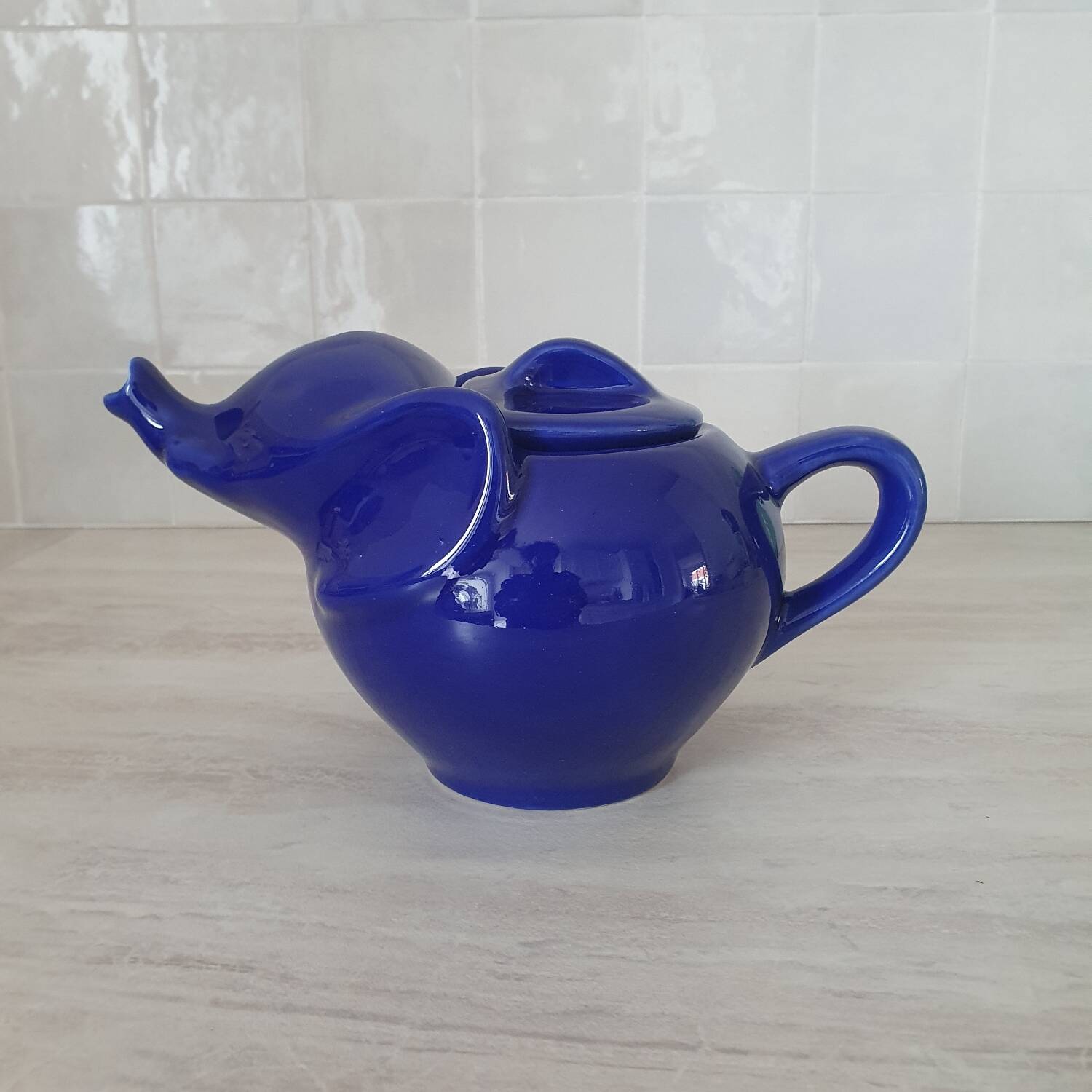 Elephant teapot by Lipton in royal blue.