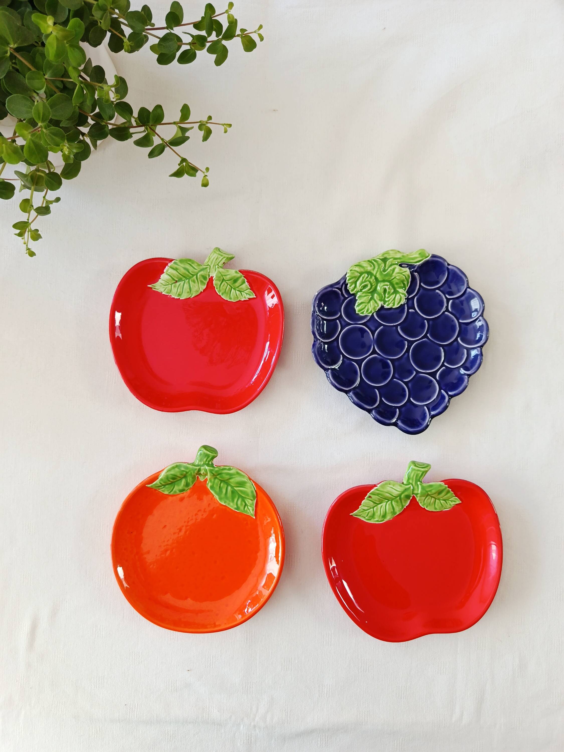bowls and cups in slipware fruits