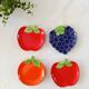 bowls and cups in slipware fruits