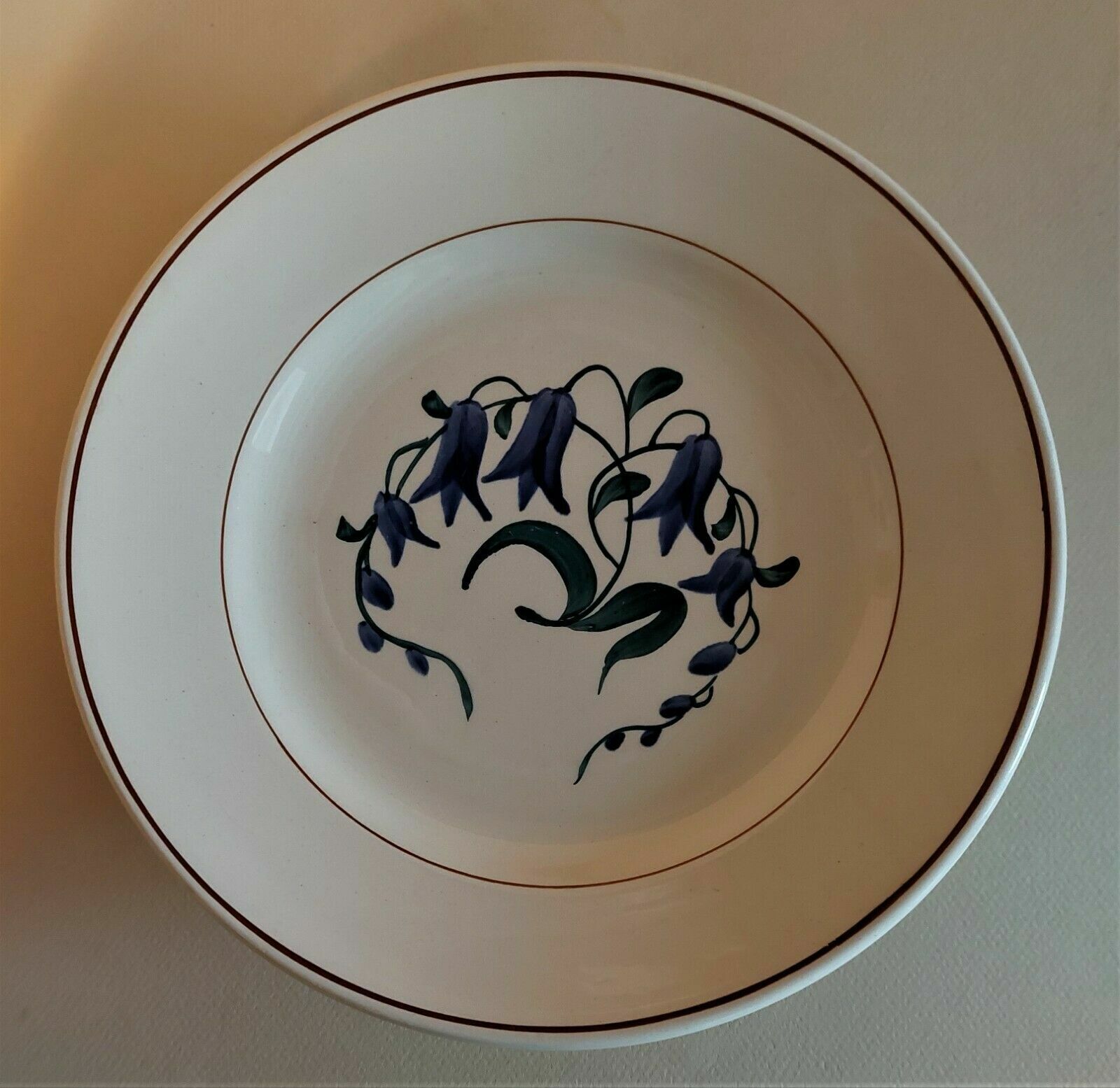 Flat plate with heel earthenware Longchamp décor Simone