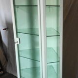 Painted metal ophthalmologist's corner display case, early 20th century