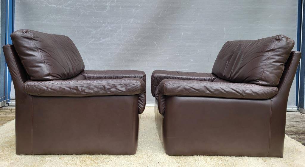 Pair of chocolate leather lounge chairs