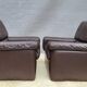 Pair of chocolate leather lounge chairs