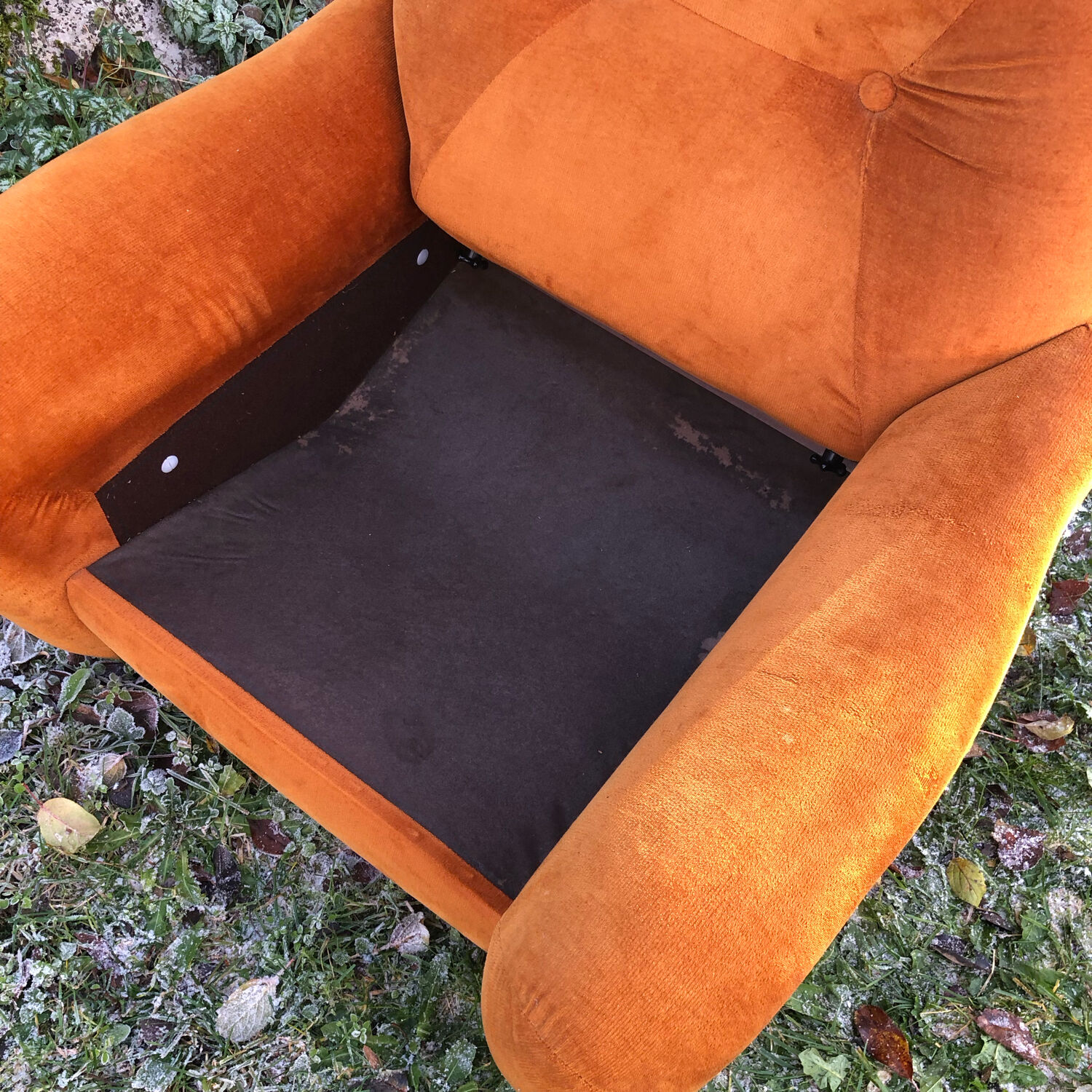 Orange velvet armchair