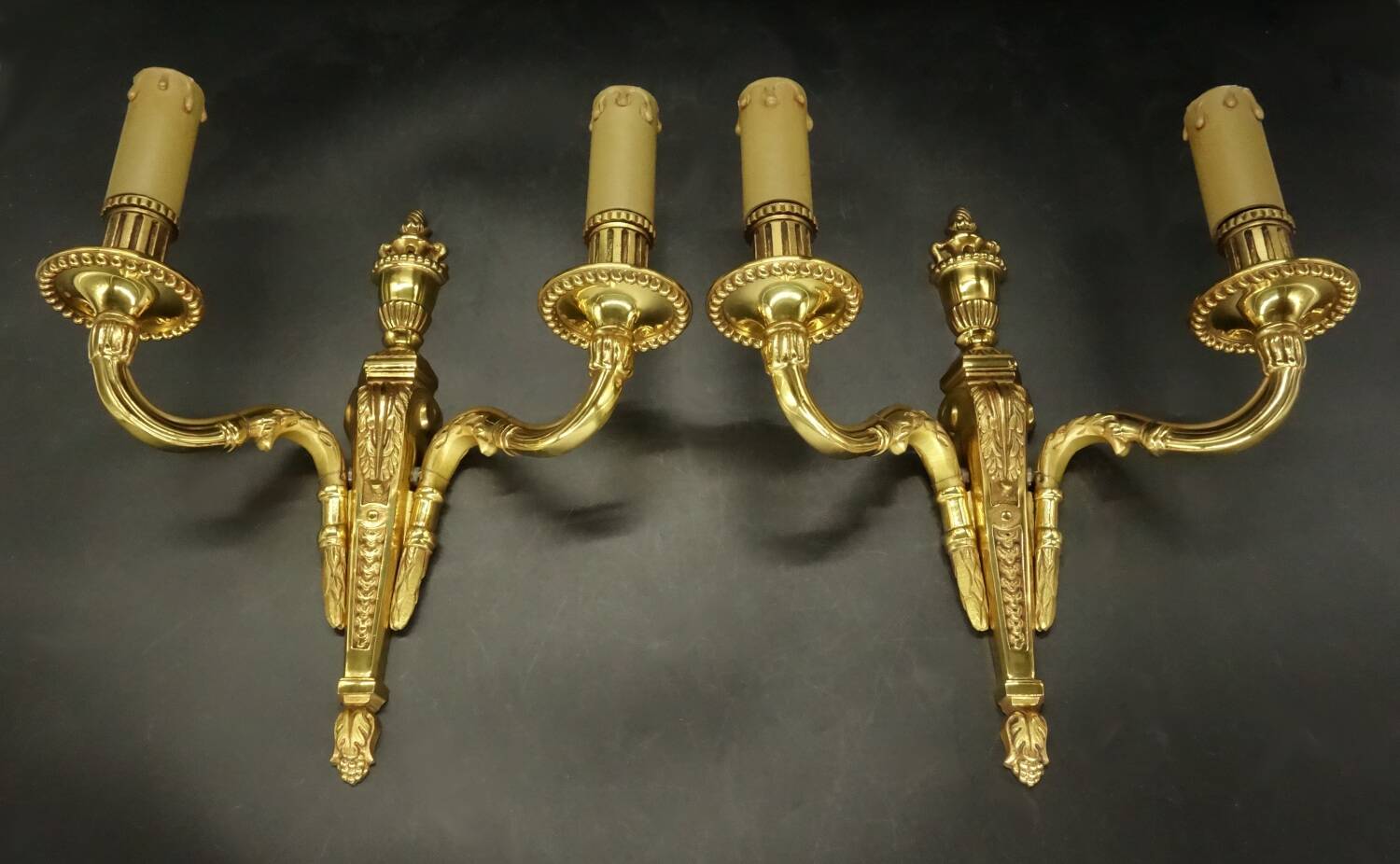 Pair of Louis XVI style urn and torch wall lights - gilt bronze