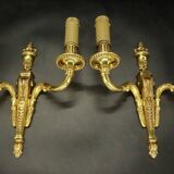 Pair of Louis XVI style urn and torch wall lights - gilt bronze