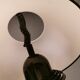 Hanging lamp, in milky white plastic with black top/suspension, probably Danish.