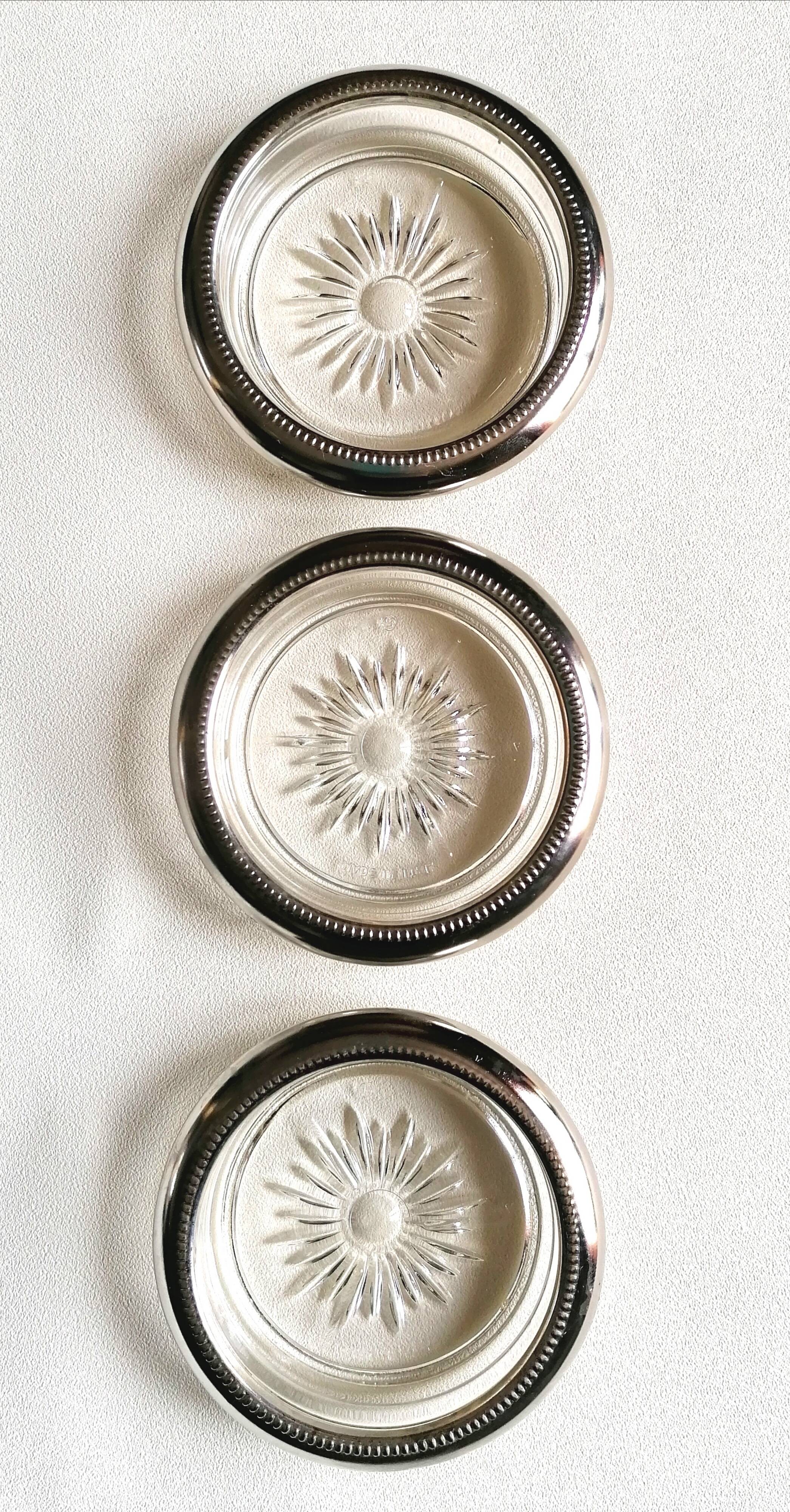 Three under silver-plated bottles
