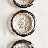 Three under silver-plated bottles