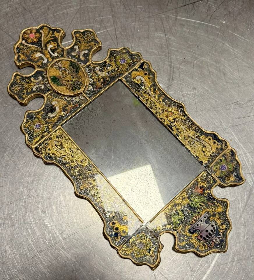 Eglomise glass mirror with scrollwork and branch races decoration