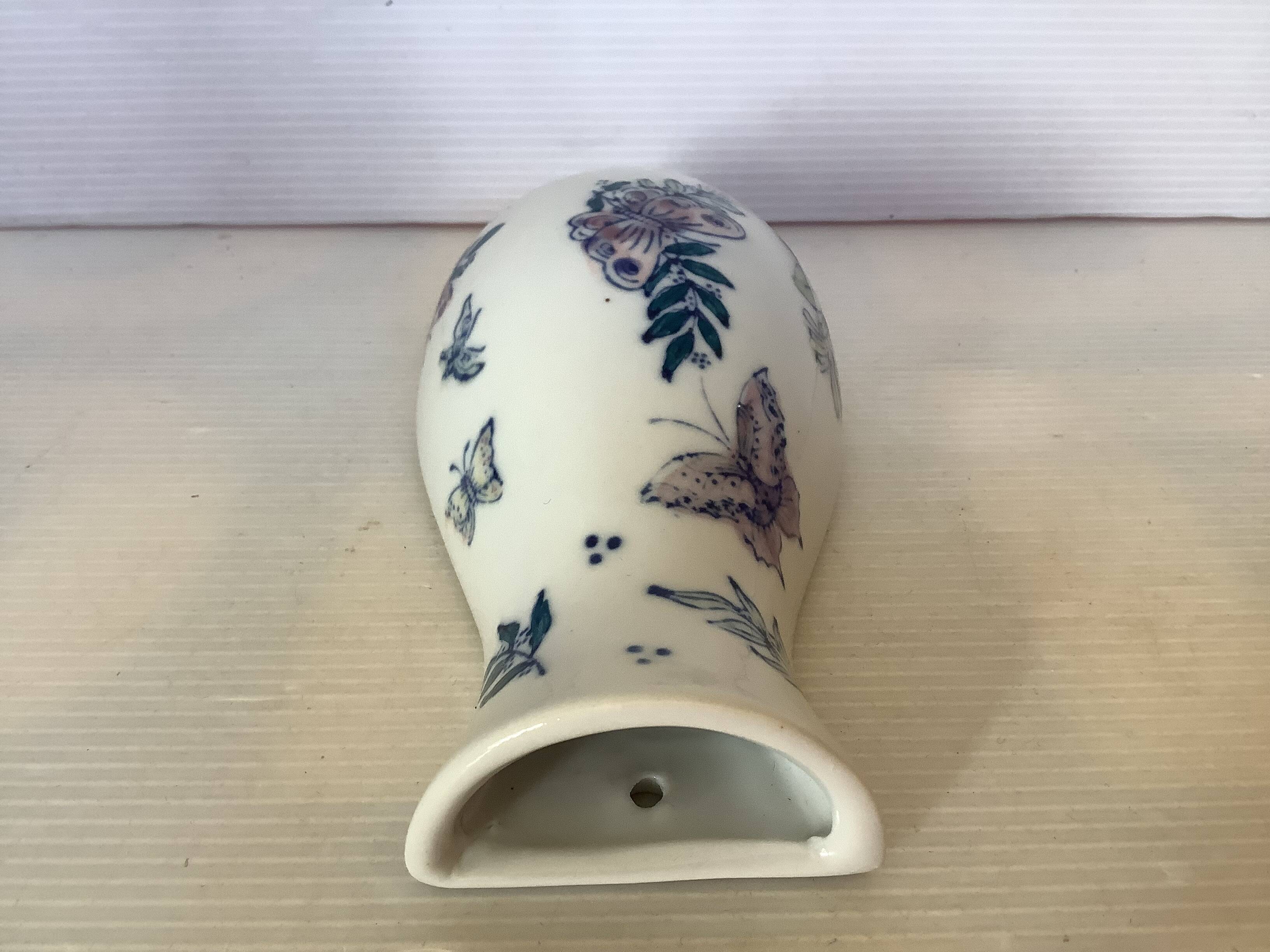 Flower vase with butterflies