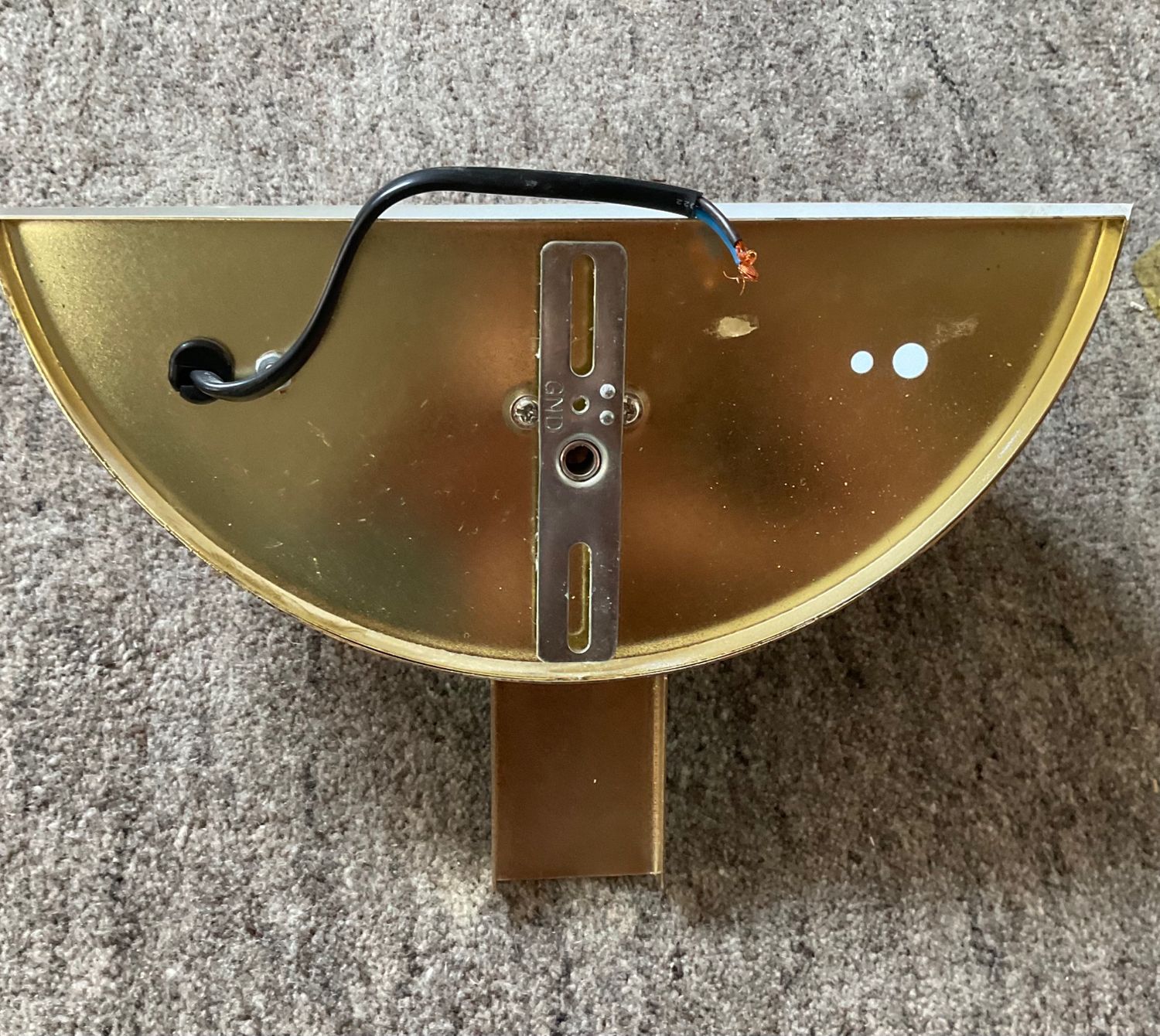 Pair of Hollywood Regency half-moon wall lamps in gilded metal and plexiglass