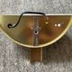 Pair of Hollywood Regency half-moon wall lamps in gilded metal and plexiglass