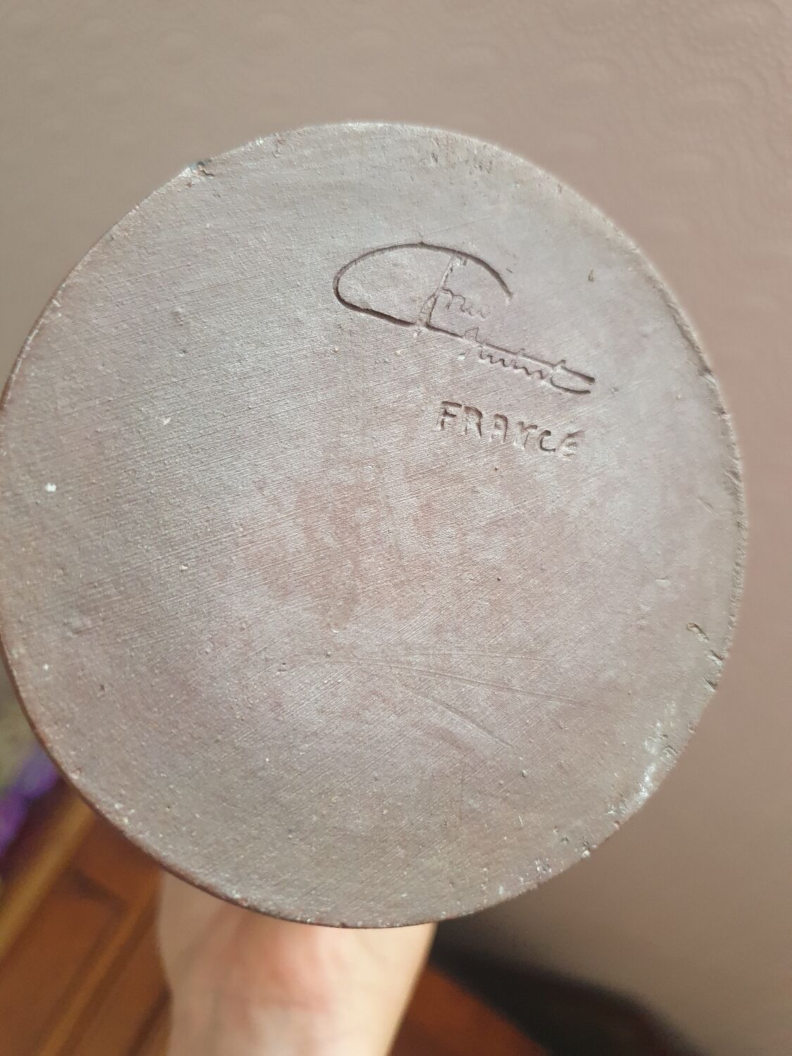 Vintage enameled stoneware pitcher signed