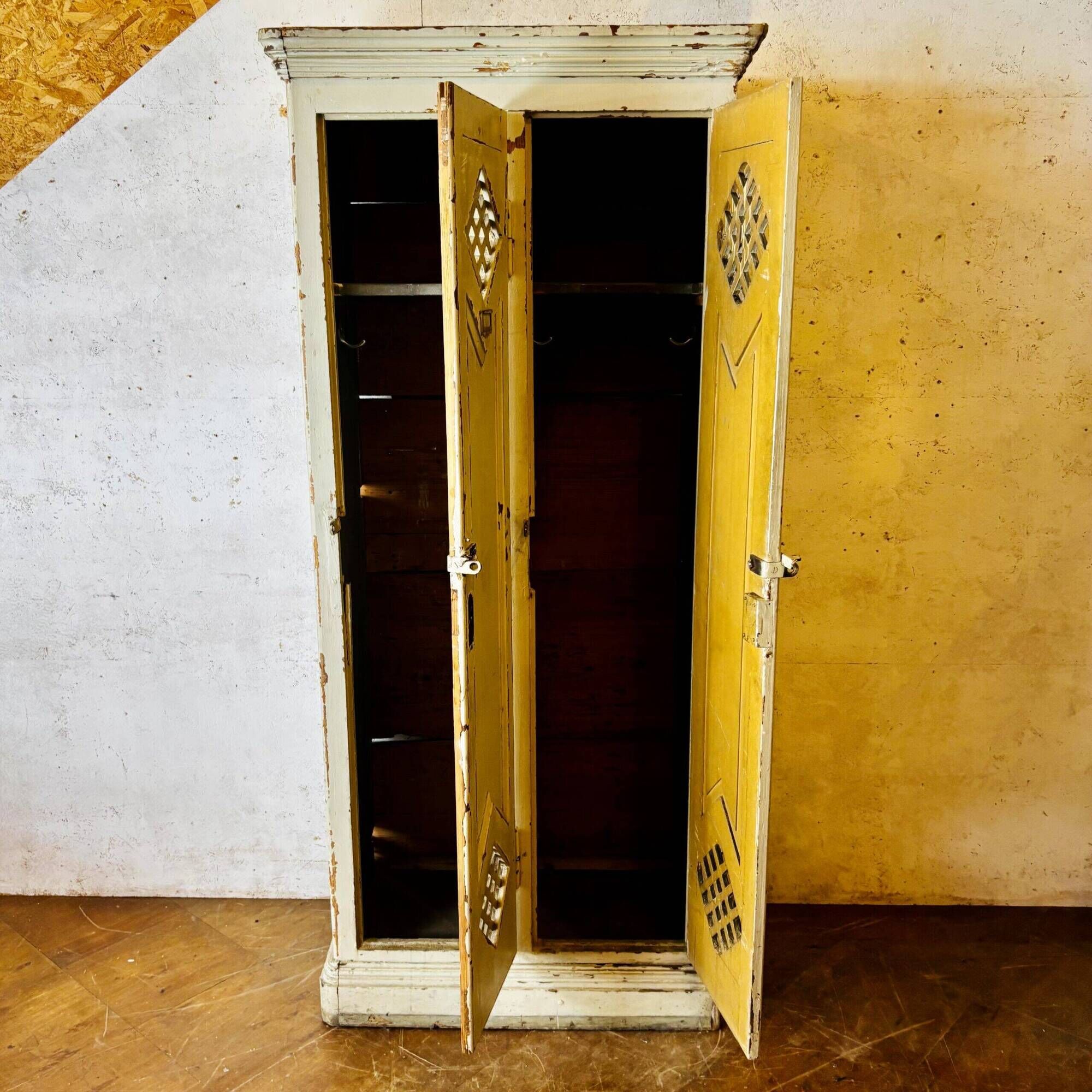 Old factory lacquered pine locker from early 20th century France.