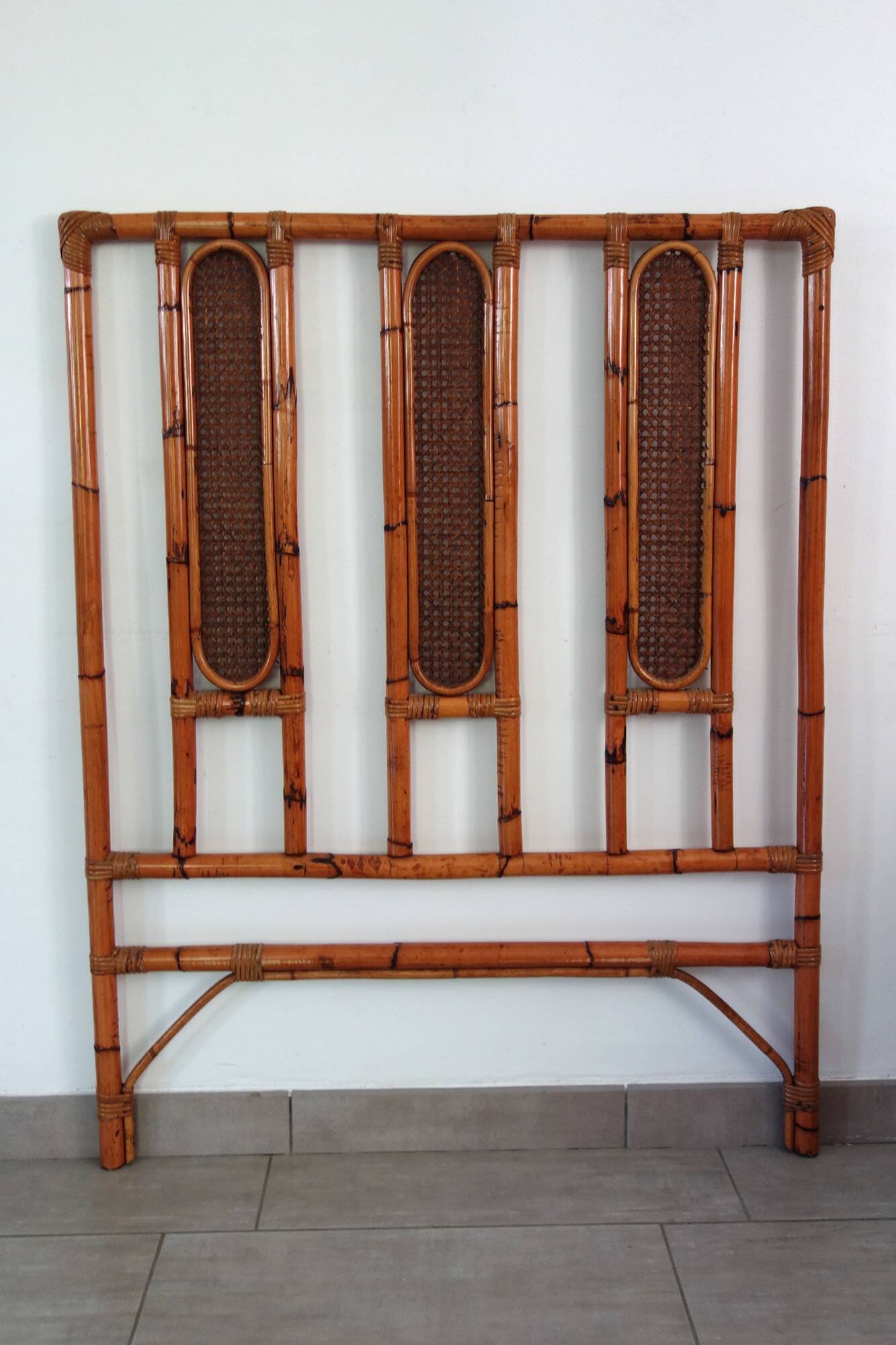 Bamboo and cane headboard from the 1970s.