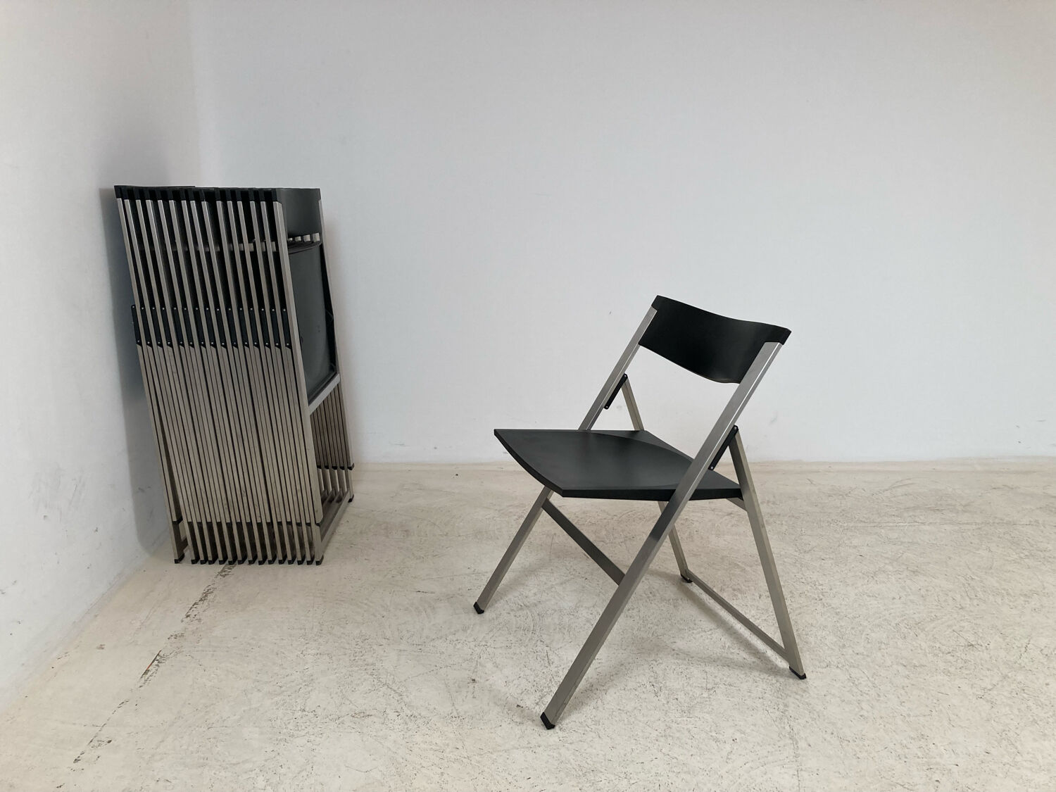 P08 folding chairs by Justus Kolberg for Tecno 1991