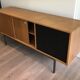 Sideboard with double sliding doors and bar on a metal base