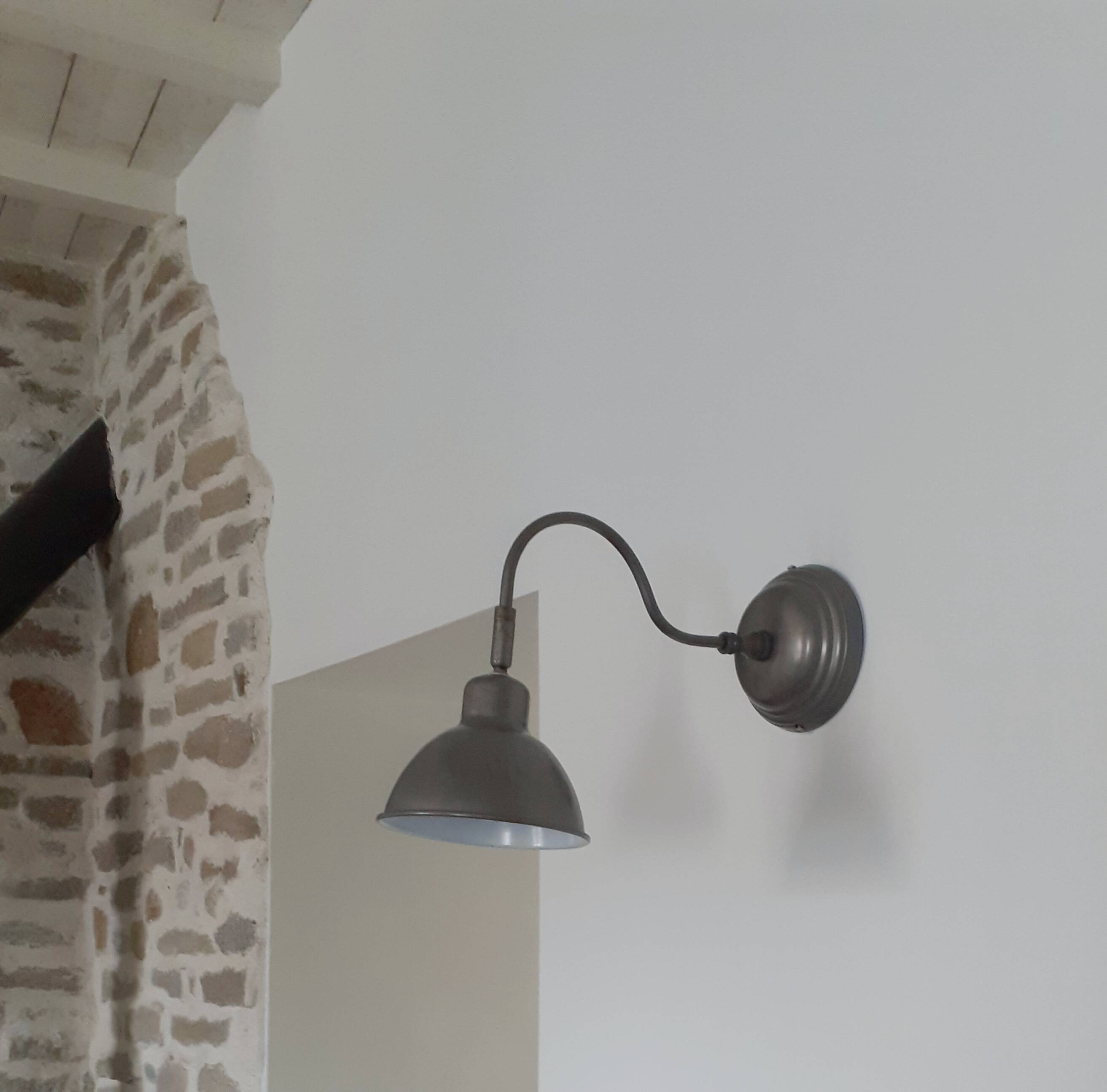 Metal wall lamp in industrial style