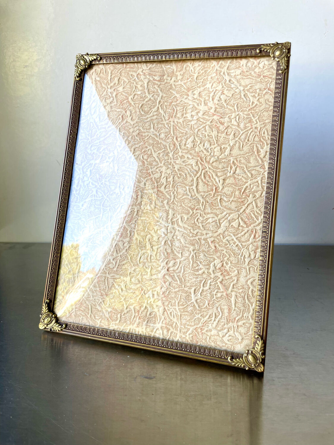 Metal vintage frame in gold colored brass