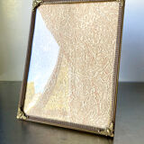 Metal vintage frame in gold colored brass