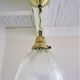 Holophane glass suspension and vintage patinated brass