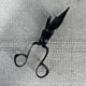 Old pair of scissors or candle snuffer