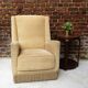 Fauteuil en velour beige et franges