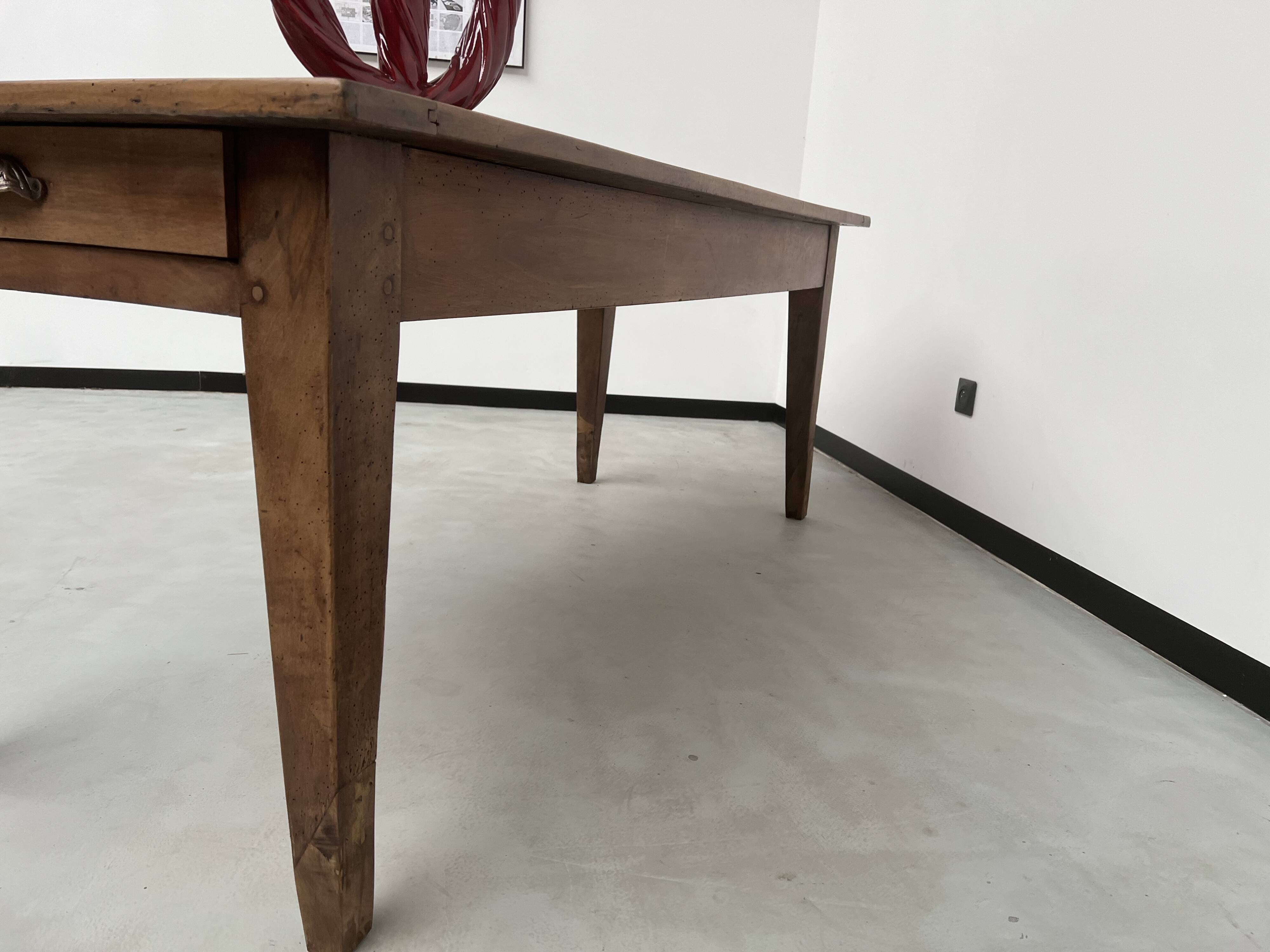 Solid walnut farmhouse table with spindle legs