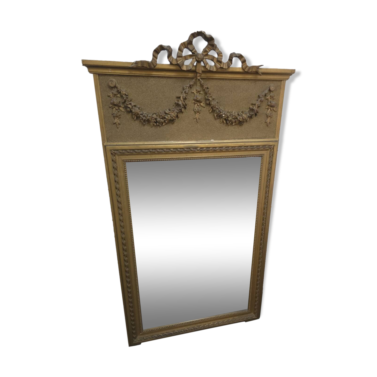 Gilded patinated trumeau mirror