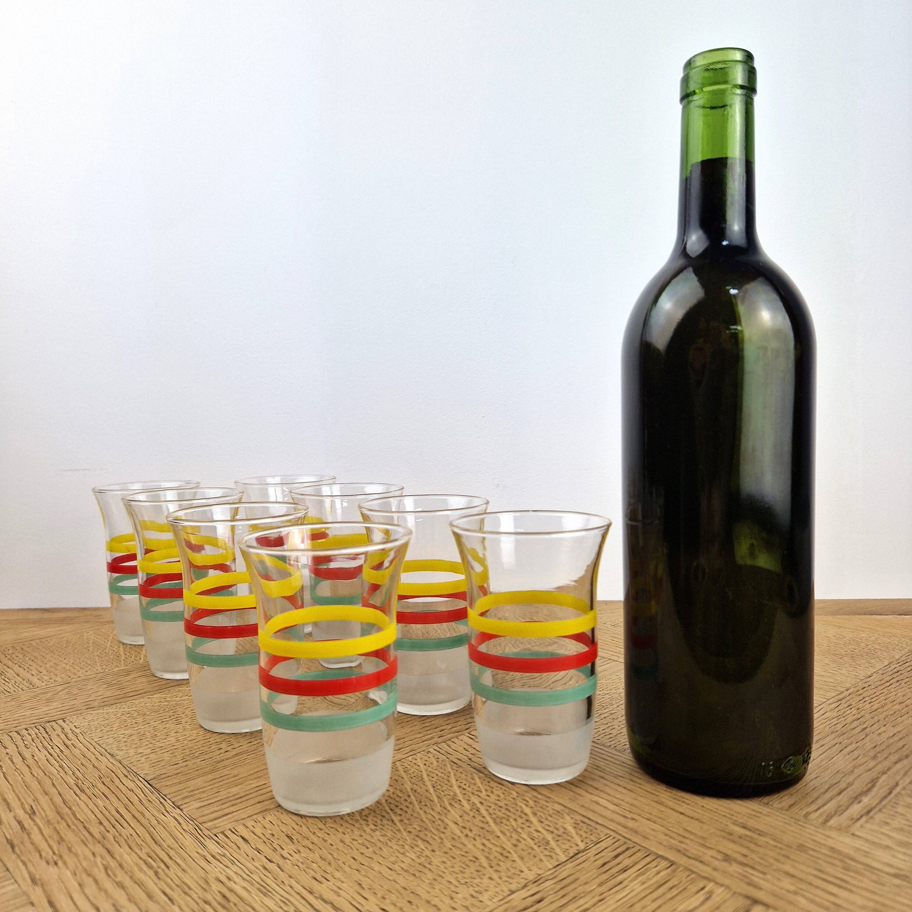 8 multicoloured vintage orangeade glasses from the 60s/70s.