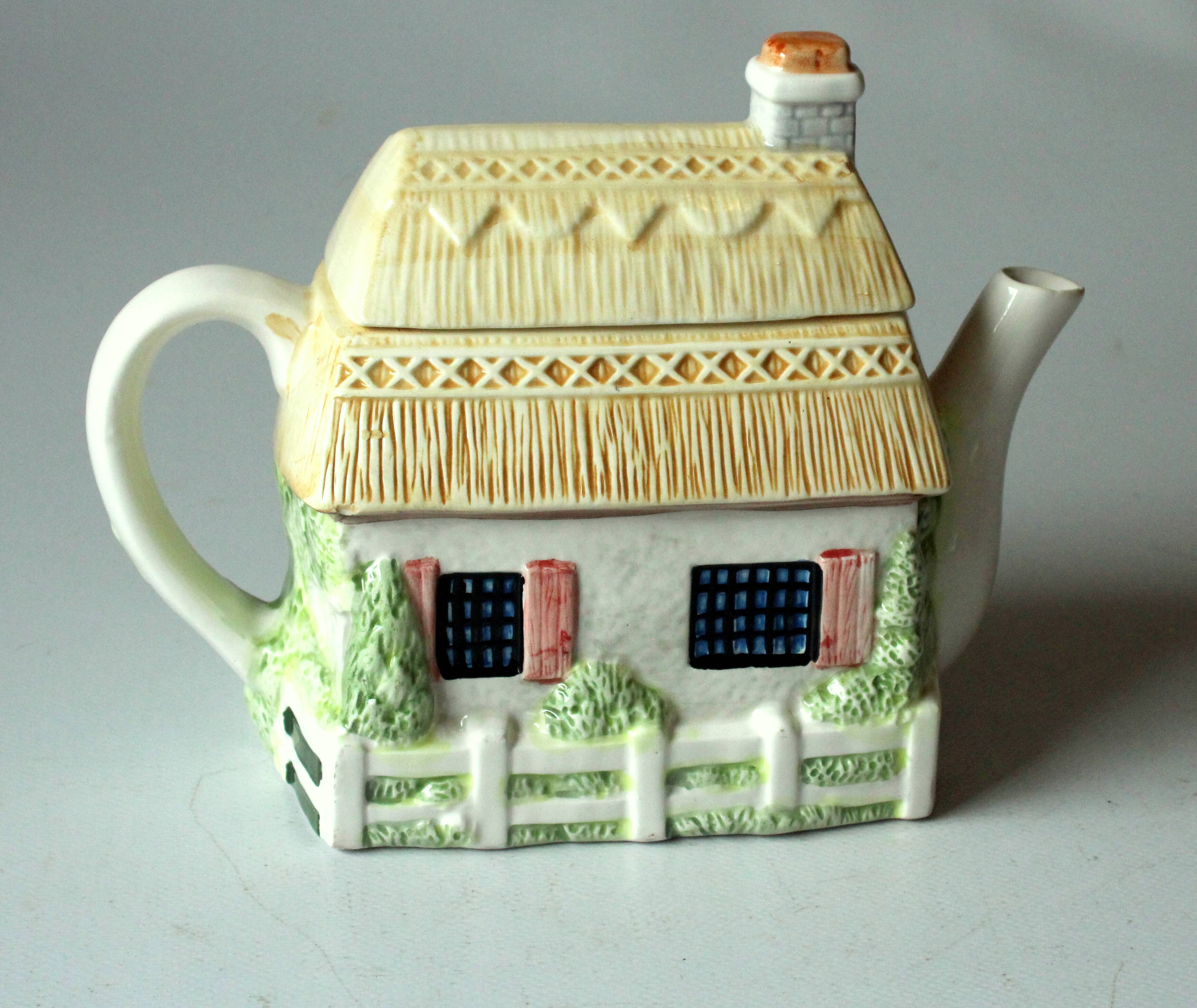 Handpainted fine ceramic design teapot "The Village"