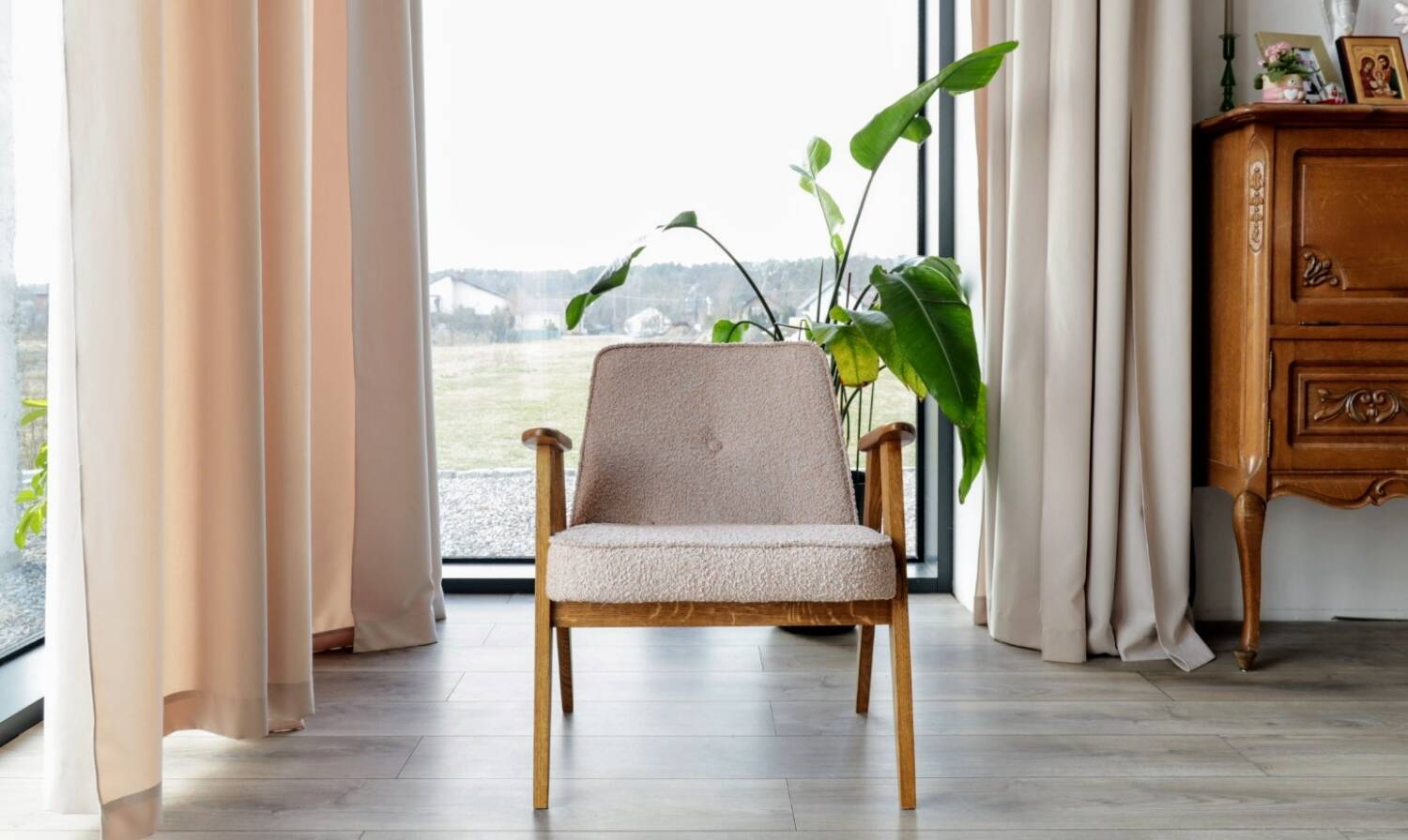 Vintage armchair in oak wood with powder pink boucle design by Chierowski.