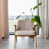 Vintage armchair in oak wood with powder pink boucle design by Chierowski.