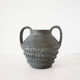 Vase with double handle in black sandstone