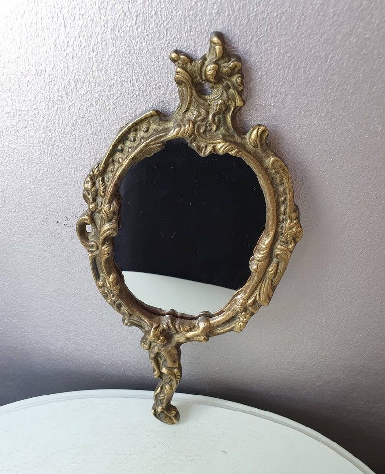 Hand mirror in brass art deco 30 years France