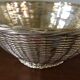 Braided silver metal basket