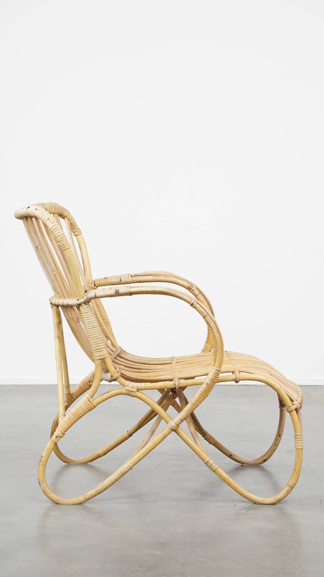 Vintage 1950s Dutch design rattan armchair with organic shapes