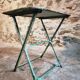 Vintage French bistro table in riveted iron – folding (1920s)