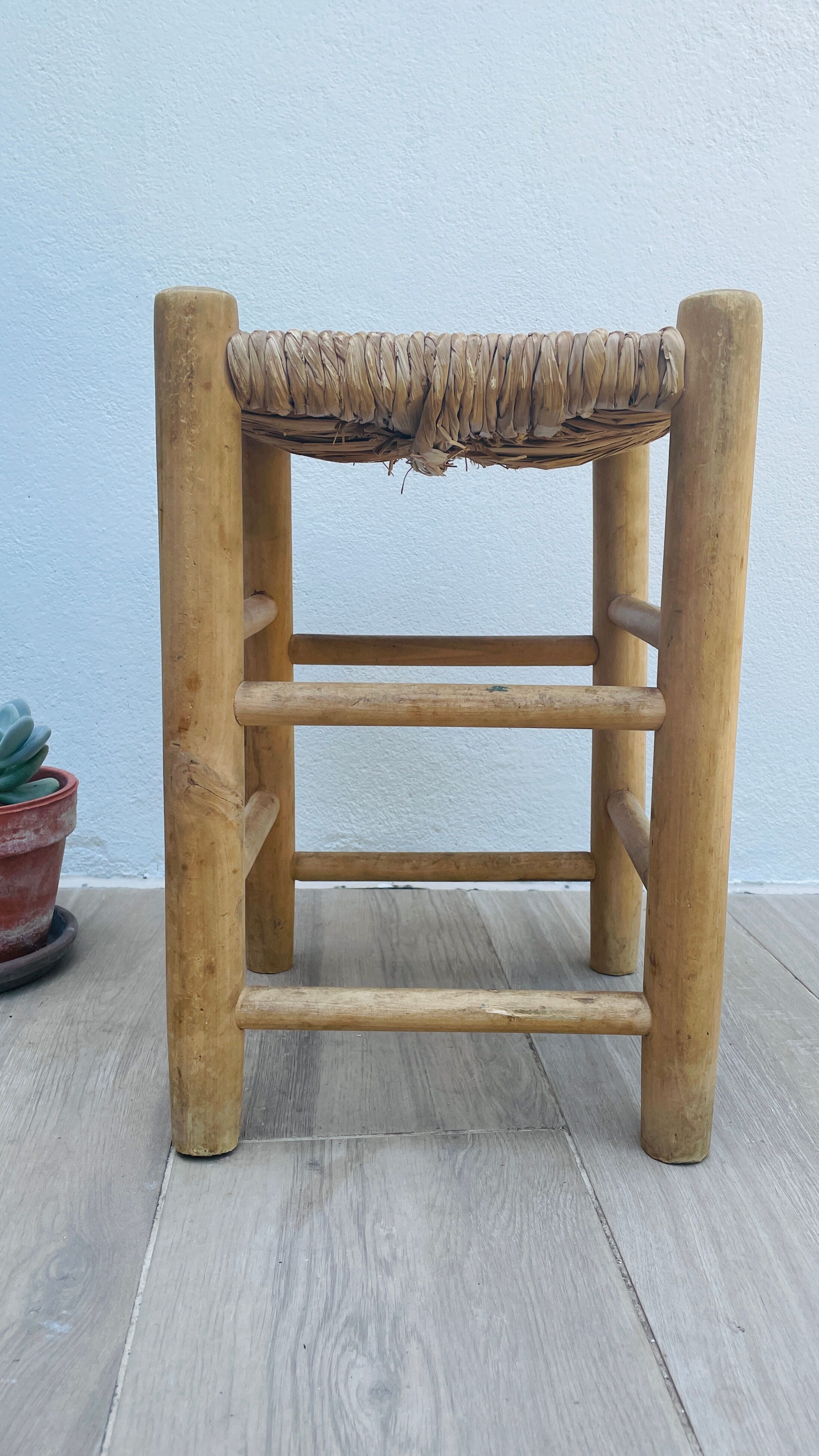 Wooden and straw stool vintage bohemian spirit