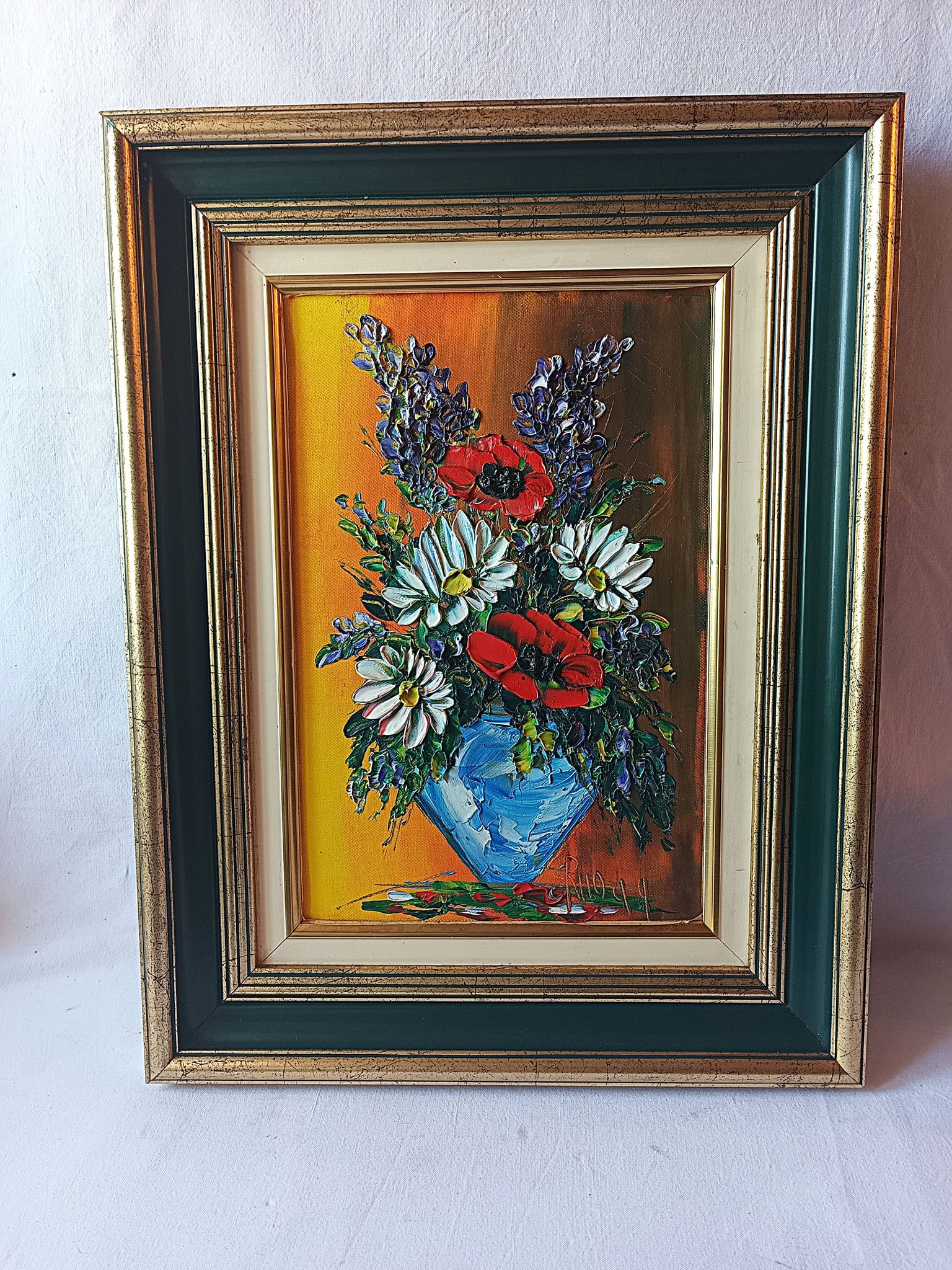 Oil painting on canvas, bouquet of flowers in a framed vase, signed.