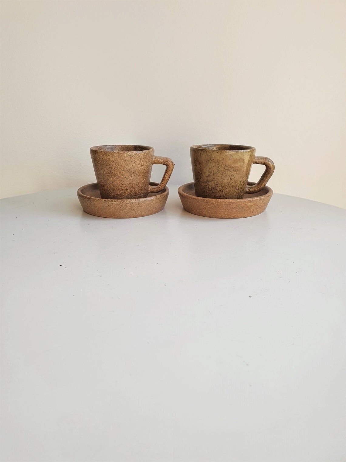 Lot of 2 cups and saucers in sandstone