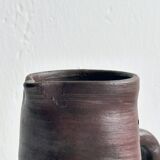 Pitcher, watering can in dark brown ceramic with matte finish.