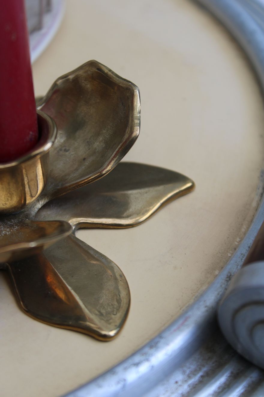 Golden brass candle holder