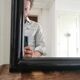 Large black lacquered mirror 1970