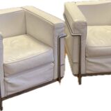 Pair of white leather and chrome armchairs