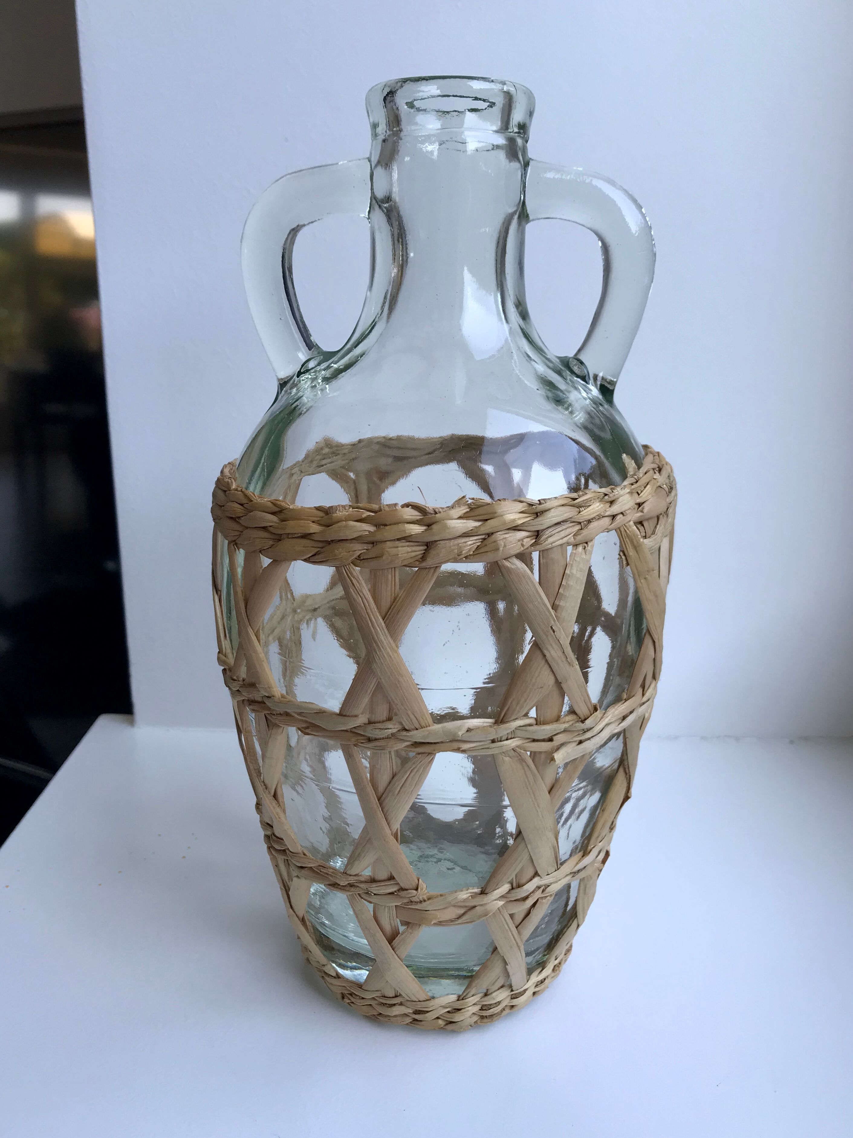 Bottle with handle and covered with wicker / rattan 70s